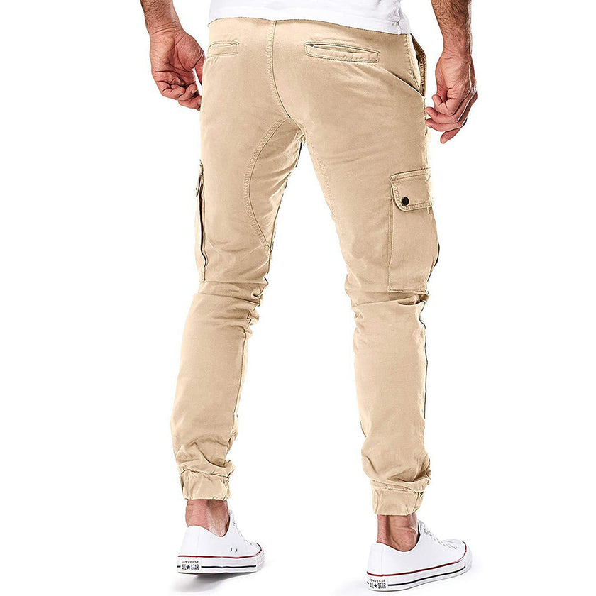 Men's FJØRNA cargo pants with functional pockets and ample storage, shown in a versatile design for outdoor or casual wear.