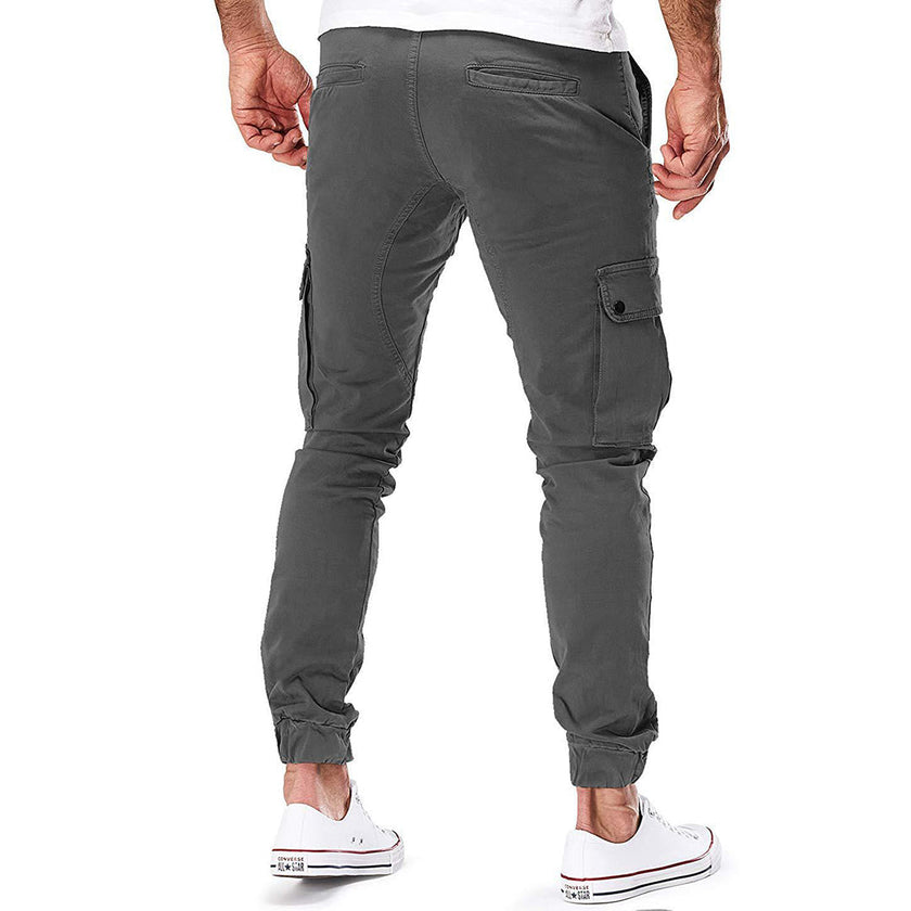 Men's FJØRNA cargo pants with functional pockets and ample storage, designed for comfort and practicality.