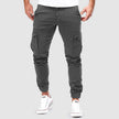 Men's cotton slim fit cargo pants with multiple pockets, stylish and comfortable FJØRNA men's pants on a model.