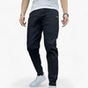 Men's FJØRNA cargo pants with stretch fabric and multiple front and back pockets, designed for comfort and durability.