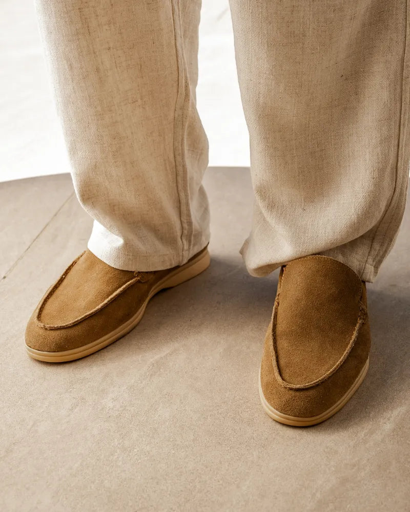 Men's classic suede loafers by FJØRNA, premium men's slippers with fur lining, showcasing sleek moccasin-style design.