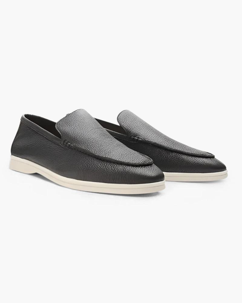 Men's elegant suede moccasins slippers by FJØRNA, showcasing refined design and soft leather material.