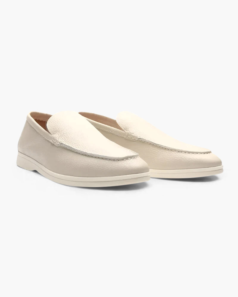 Men's elegant suede moccasin slippers by FJØRNA with a refined design and soft leather upper.