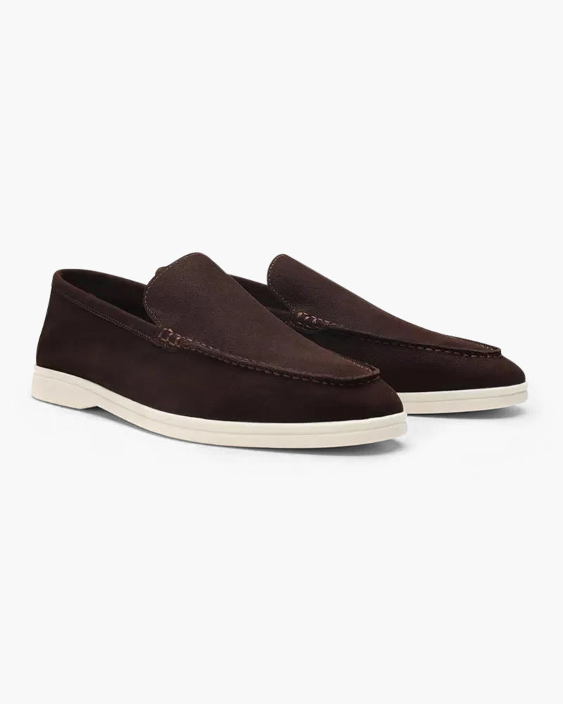 Men's elegant suede moccasin slippers by FJØRNA, featuring a refined design and soft leather material.