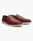 Men's elegant suede moccasin slippers by FJØRNA, showcasing a stylish and comfortable design in rich leather.