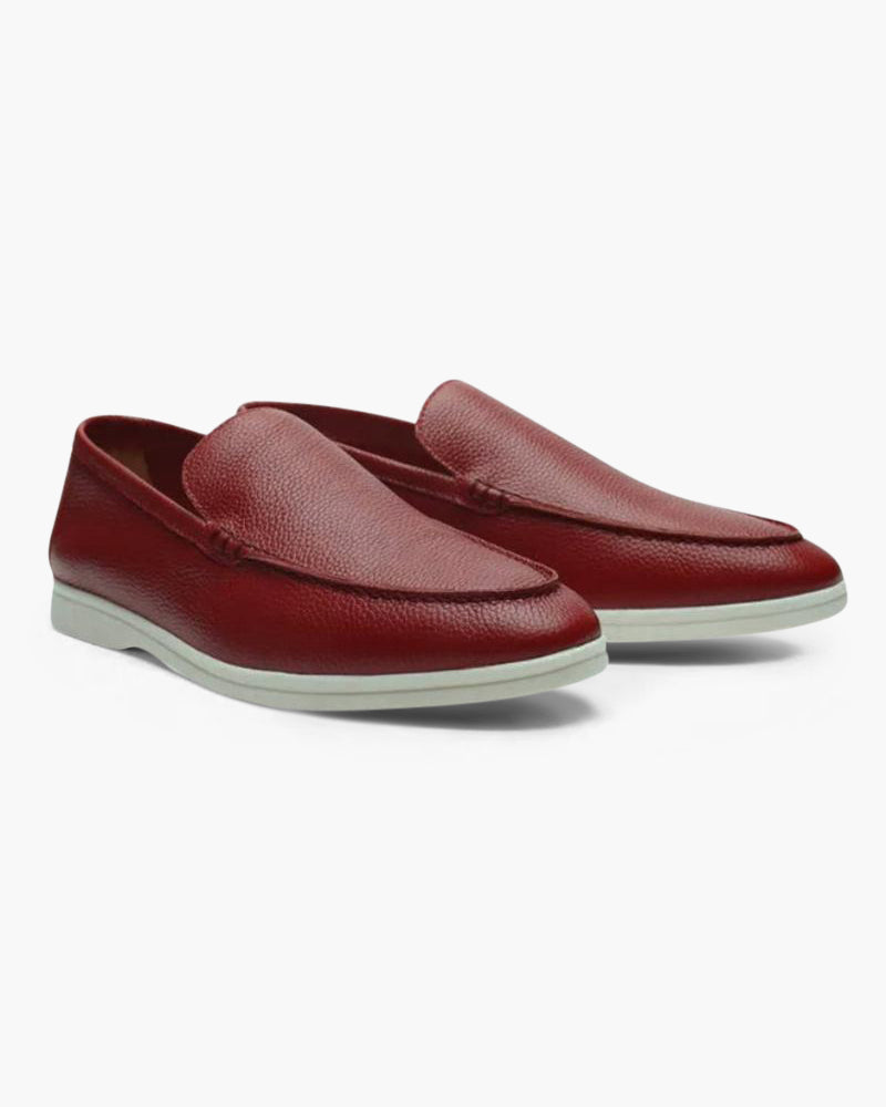Men's elegant suede moccasin slippers by FJØRNA, showcasing a stylish and comfortable design in rich leather.