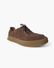 Men's suede slippers with rubber soles by FJØRNA, showing soft suede upper and sturdy slip-resistant rubber outsole.
