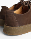 Men's suede slippers with rubber sole by FJØRNA, showcasing comfortable slip-on dress shoe design in natural suede material.