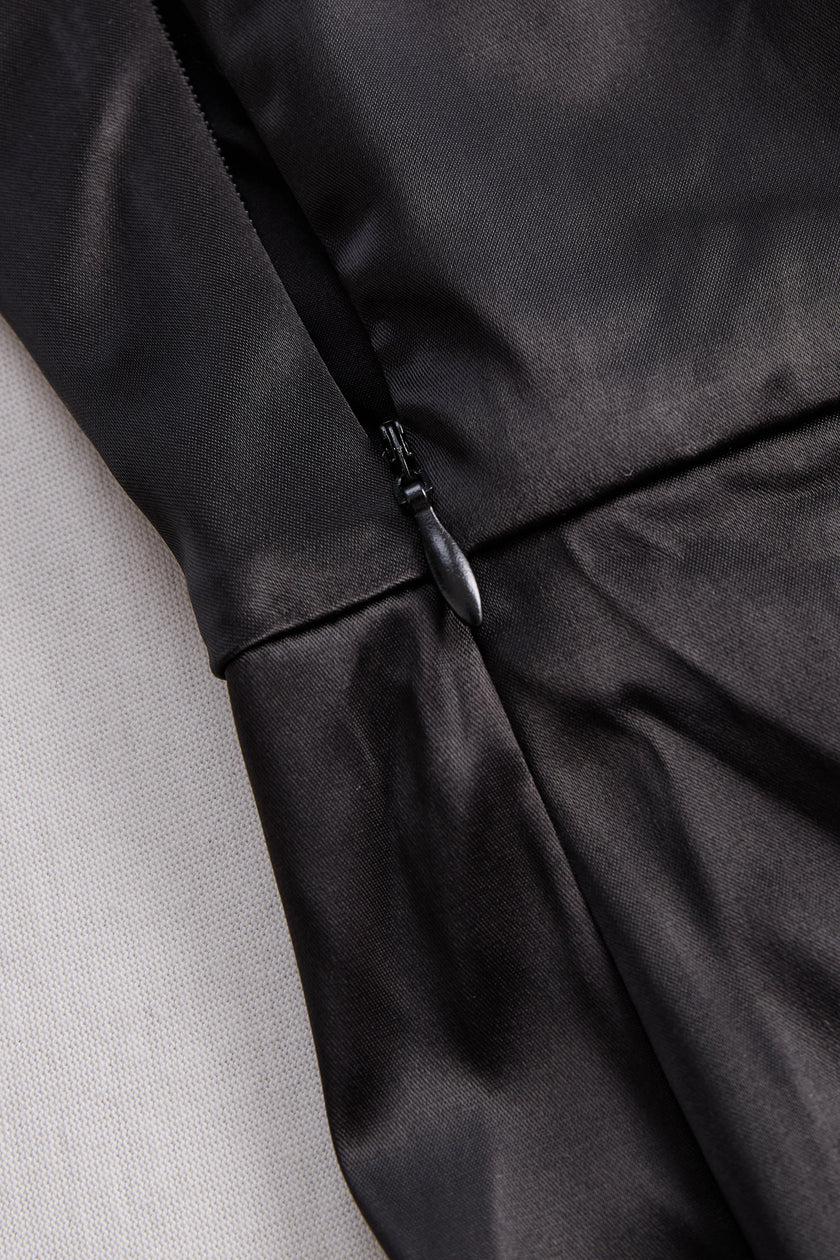FJØRNA Glamorous Allure black one-shoulder maxi dress, elegant evening gown with flowing fabric and stylish design.