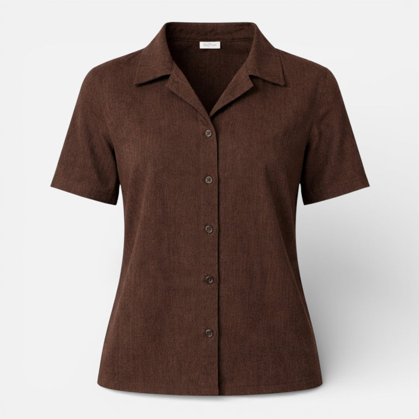 FJØRNA women's short sleeve button-up shirt with a classic design, shown in a light fabric with a collar and front buttons.