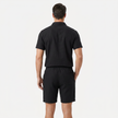 Men's linen short sleeve polo shirt and shorts set by FJØRNA, featuring a casual, breathable summer outfit in light fabric.