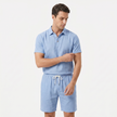 Men's linen short sleeve polo shirt and shorts set by FJØRNA, lightweight and breathable summer casual outfit.