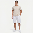 Men's linen cargo shorts with drawstring waist by FJØRNA, showing the lightweight fabric and casual fit.
