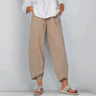 FJØRNA Tarni™ chic summer pants in lightweight fabric, featuring a relaxed fit and stylish design for warm-weather wear.