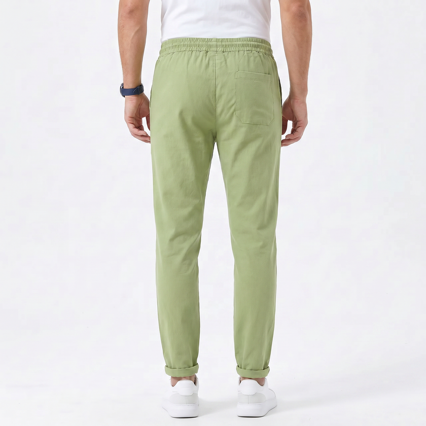 Men's stretchable comfort trousers by FJØRNA, showcasing the relaxed fit and flexible fabric, ideal for casual wear.