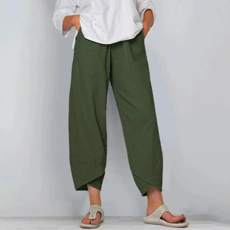 FJØRNA Tarni™ chic summer pants in lightweight fabric, featuring a relaxed fit and stylish design for warm weather wear.