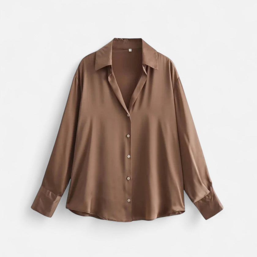 FJØRNA women's button-front long sleeve blouse in classic fit, featuring a tailored design and front buttons.