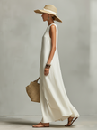 Ivory linen sleeveless mini dress by FJØRNA, casual dress with a relaxed fit, featuring a simple sleeveless design and lightweight fabric.