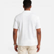 Men's FJØRNA Jacquard Knit Polo Shirt in breathable, slim fit design, ideal for casual summer wear, with detailed knit pattern.