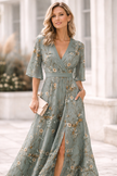 Elegant floral V-neck dress for women by FJØRNA, showcasing a stylish, flowy design perfect for casual or semi-formal occasions.