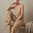 FJØRNA tailored linen sleeveless vest with high-waisted pleated trousers in khaki, stylish 2-piece set for a sophisticated look.
