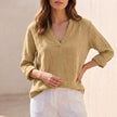 FJØRNA women's khaki V-neck linen summer blouse, casual lightweight top with relaxed fit and short sleeves.