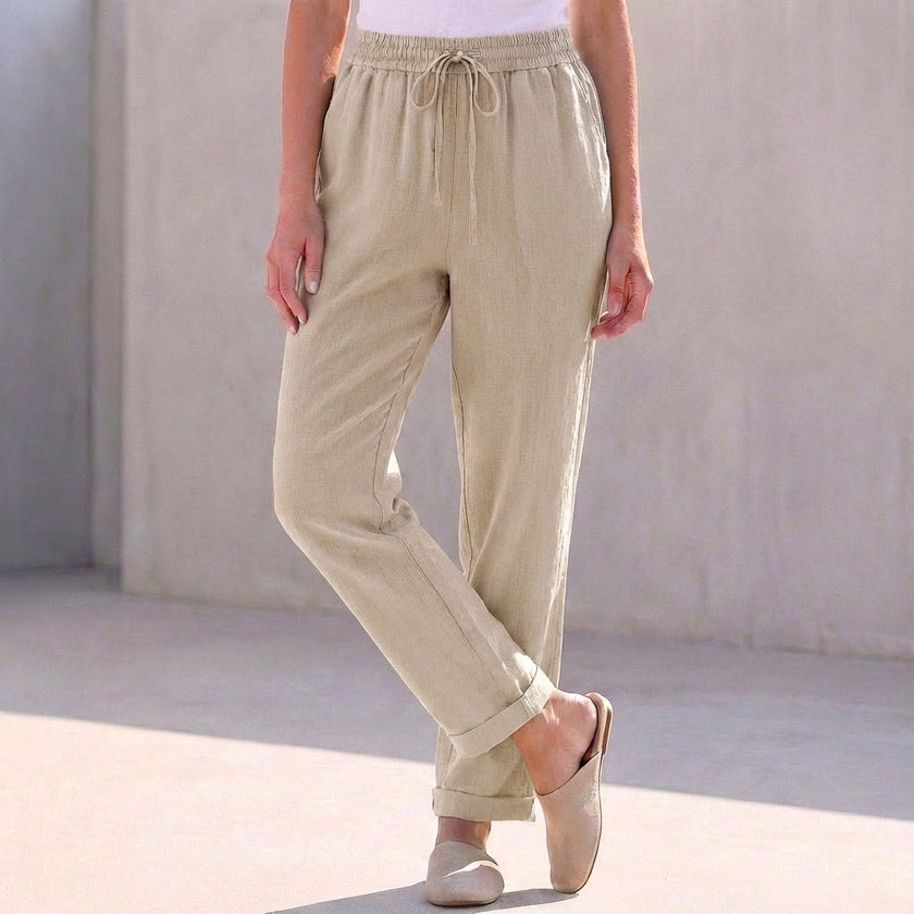 FJØRNA women's summer linen trousers with drawstring waist in khaki, casual and breathable for warm weather.