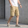 FJØRNA men's casual cargo shorts in khaki with distinctive stitch detail and multiple pockets for a practical, stylish look.