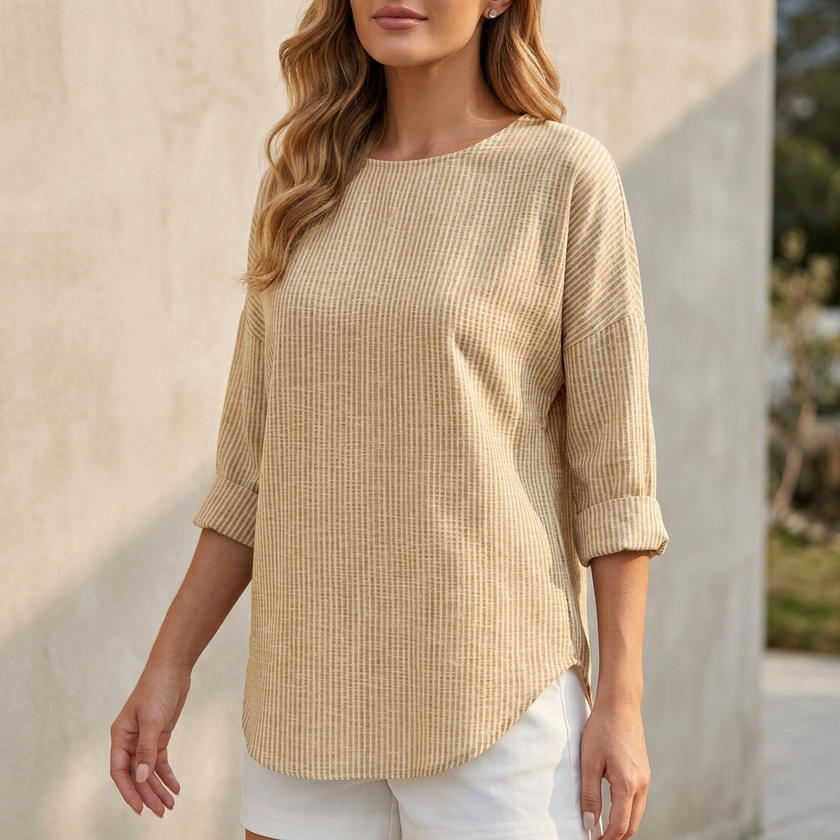 Khaki relaxed-fit women's blouse by FJØRNA with rolled sleeves and a curved hem, displayed on a mannequin.