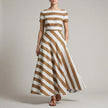 FJØRNA A-line striped maxi dress for women in khaki with pockets, featuring a flowy silhouette and casual style.