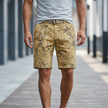 Men's casual work shorts by FJØRNA with leaf print, khaki color, belt, and comfortable fit, perfect for everyday wear.