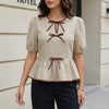 Khaki FJØRNA women's summer blouse with puff sleeves, denim fabric, casual top for warm weather, stylish and comfortable.