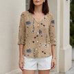 FJØRNA women's summer blouse with floral pattern, V-neck, khaki denim fabric, button front, stylish women's top.