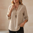 FJØRNA women's summer blouse in khaki linen with a flowy design and V-neck, perfect for casual and warm-weather outfits.