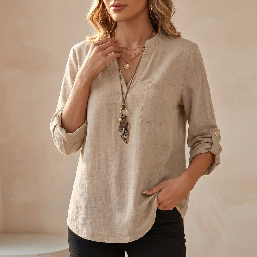 FJØRNA women's summer blouse in khaki linen with a flowy design and V-neck, perfect for casual and warm-weather outfits.