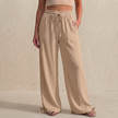 FJØRNA women's summer linen trousers in khaki with pockets and drawstring waist, lightweight and comfortable for warm weather.