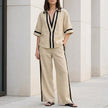 FJØRNA coastal chic khaki contrast trim top and wide-leg pants 2-piece set, casual summer outfit with relaxed fit and stylish details.