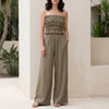 FJØRNA khaki smocked strapless top and wide-leg pants resort set, 2-piece summer outfit on a model.