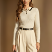 Knitted Henley T-shirt for women by FJØRNA, featuring a casual, textured knit design and classic collar style.
