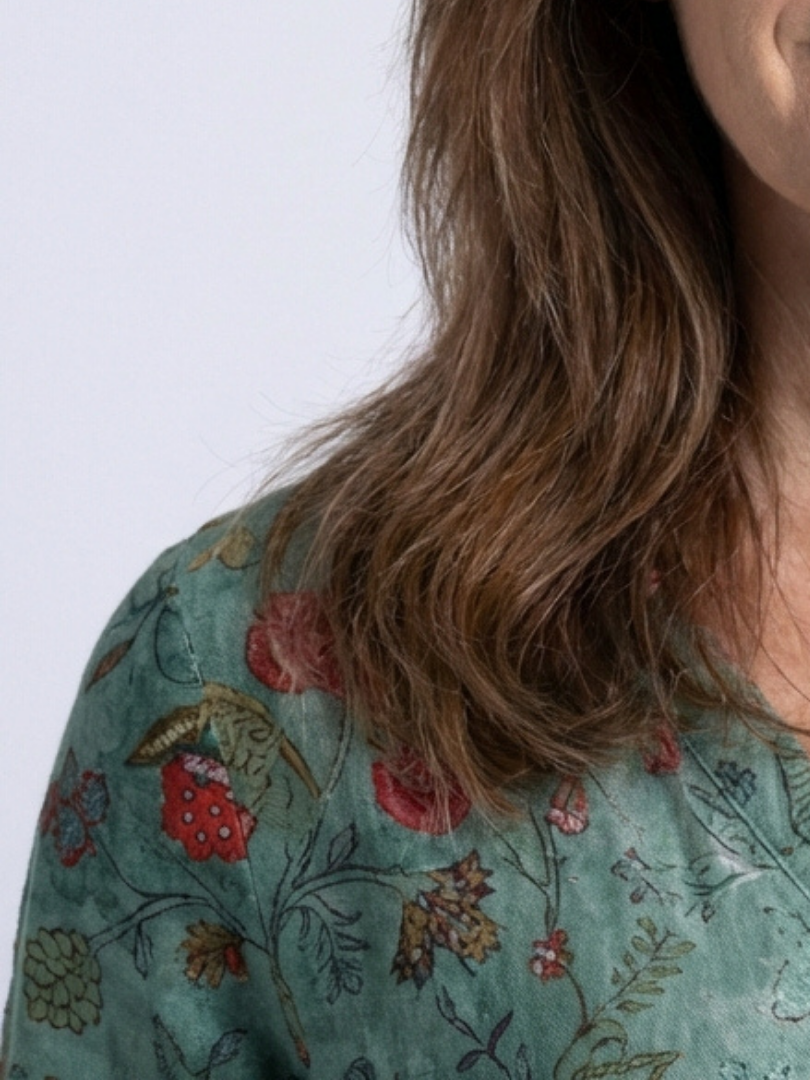 FJØRNA women's floral summer maxi dress, lightweight and flowy, perfect for warm weather, featuring a vibrant floral pattern.