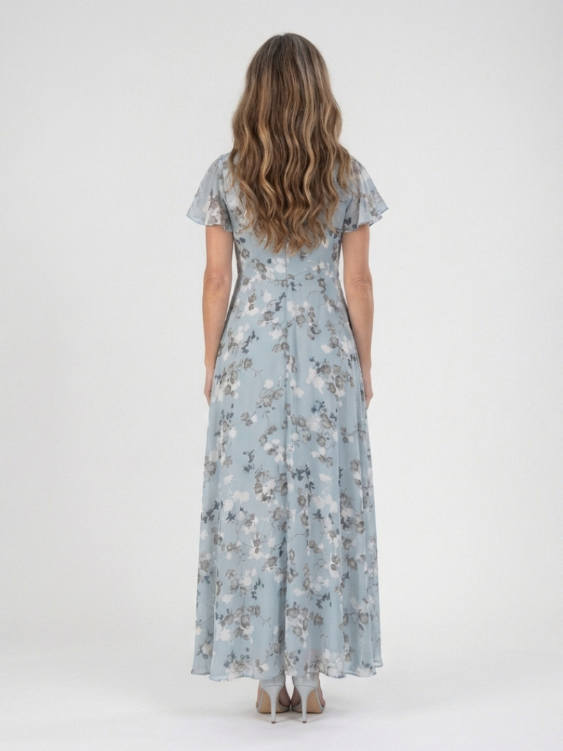 FJØRNA women's summer maxi dress featuring a floral pattern and flutter sleeves, perfect for warm-weather casual wear.