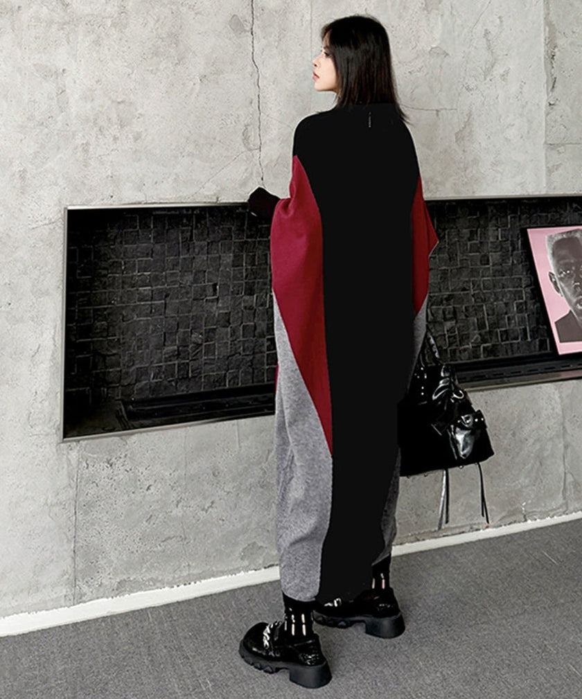 FJØRNA Panel Knit Long Dress in white, showcasing its elegant, flowing design and textured knit fabric.