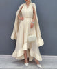 White Veil Flow Dress by FJØRNA, featuring flowing fabric and elegant design, perfect for stylish occasions.