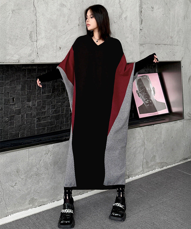 White FJØRNA Panel Knit Long Dress hanging on a mannequin with a fitted silhouette and long sleeves.