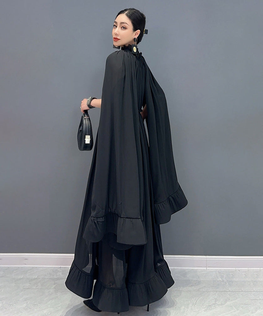 White Veil Flow Dress by FJØRNA featuring a flowing design and elegant silhouette, shown on a model.