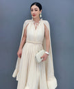 FJØRNA Veil Flow Dress in white, a stylish and elegant dress with flowing fabric, perfect for special occasions.