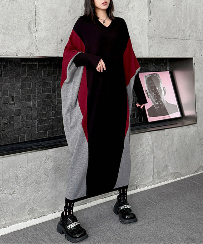 White FJØRNA panel knit long dress displayed on a model, featuring a fitted silhouette and elegant length.