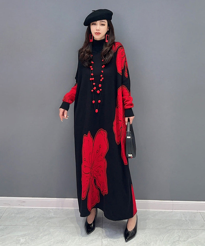 White floral motif knit long dress by FJØRNA featuring a graceful, fitted silhouette and intricate floral patterns.