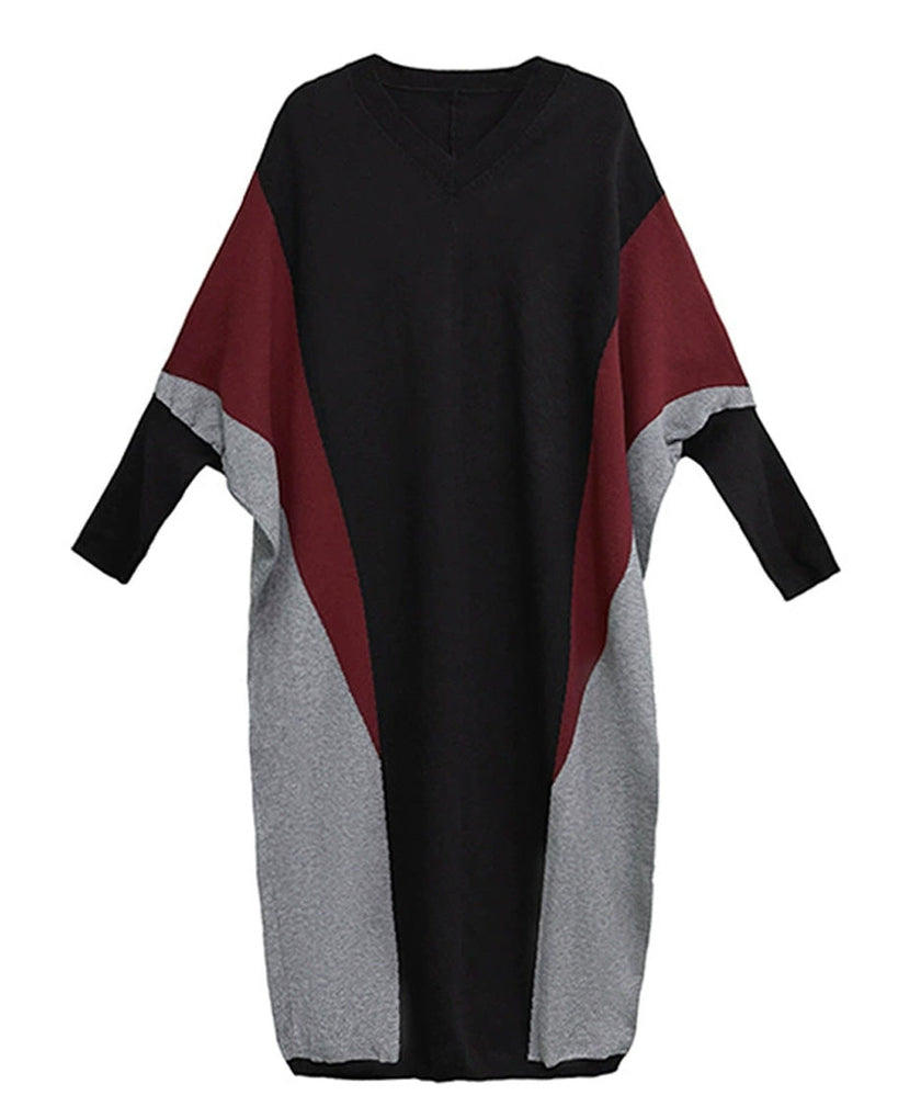 FJØRNA Panel Knit Long Dress in white, featuring a flowing knit design and long sleeves, styled for elegant comfort.