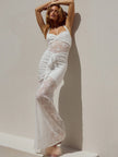 FJØRNA lace maxi dress featuring delicate lace fabric, flowing silhouette, and elegant design ideal for formal occasions.